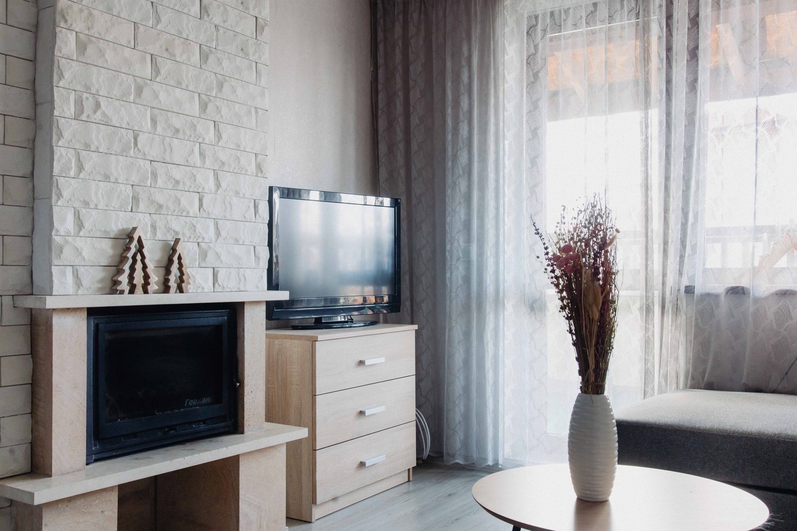 Living room of the Bansko apartment with fireplace